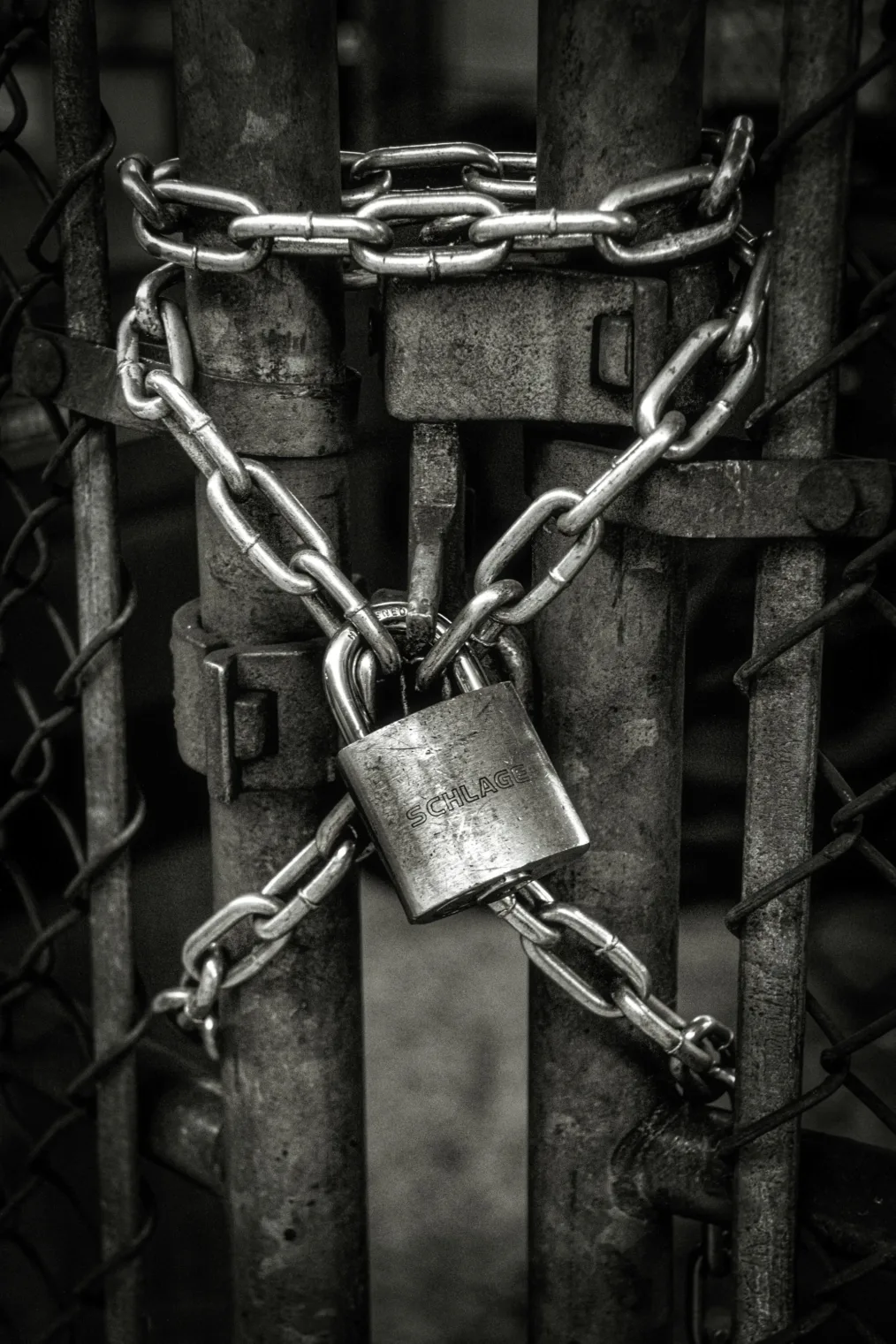 Black and white image of a lock and chain to indicate security